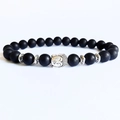 Matte black volcanic lava stone bracelet with silver Buddha head and floral spacers - Frosted Black Stone