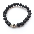 Spiritual energy bracelet featuring black lava stones and silver Buddha head charm - Lava Stone Silver Buddha Style