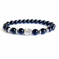 Polished black onyx beaded bracelet featuring a silver Buddha head and ethnic spacers - Black Stone