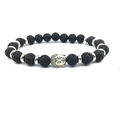 Handcrafted black lava stone bead bracelet featuring a detailed silver buddha head charm - Lava Stone