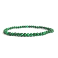 Natural malachite beaded bracelet with 4mm green stones and elastic cord on white background - Malachite