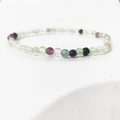 Multi-colored 4mm natural gemstone beaded stretch bracelet featuring purple and green fluorite - Colorful Fluorite