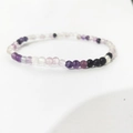 Elastic beaded bracelet featuring purple amethyst, clear quartz, and black obsidian stones - Purple Fluorite