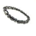 Macro shot of hematite beaded elastic bracelet with alternating cylindrical and round beads - Beads and Pillars Mix (No. 1)