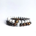 Detail of beaded bracelet set featuring white marble stone and brown tiger eye stone beads - 2-Piece Set