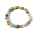 Elastic beaded bracelet with matte natural stone beads and silver hollow paw print charm - Amazonite