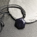 Macro detail of hexagonal blue sand stone pendant with adjustable black braided cord - Blue Sandstone