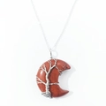 Macro detail of crescent moon pendant with red jasper and tree of life wire wrapping - Red Jasper