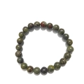 Macro shot of 8mm green unakite natural stone beads with smooth polished texture - Dragon Blood Stone