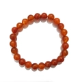 Macro detail of 8mm red agate beads bracelet with smooth polished natural crystal surface - 8mm / Red Agate