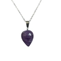 Macro detail of teardrop-shaped purple amethyst pendant with elegant silver chain - Purple Crystal