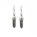 Detail of dalmatian jasper hexagonal column earrings with silver hooks and natural patterns - Dalmatian Jasper