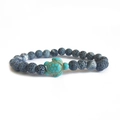 Elastic beaded bracelet with blue-grey cracked stones and a turquoise turtle charm - Agate