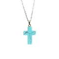 Détail d'un pendentif croix en turquoise avec veines noires sur une chaîne argentée - Turquoise Bleue / 18*25mm