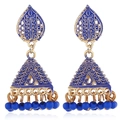 Detailed view of bohemian Jhumka earrings with gold finish and blue enamel beads - Sapphire Blue