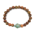 Elastic beaded bracelet with brown stone beads and a blue sea turtle charm - Red Leopard Skin Jasper