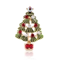 Macro shot of green enamel Christmas tree brooch with sparkling colorful rhinestones - KC Gold Multicolor
