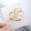 Fermaglio dorato a forma di cuore con perle bianche e un cristallo brillante elegante - Cuore
