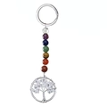 Detailed view of Tree of Life keychain with seven colorful chakra beads and wire-wrapped pendant - Clear White