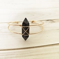 Handmade gold wire wrapped open bangle featuring a natural black hexagonal crystal point - Black Agate
