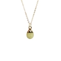 Detail of light green teardrop crystal pendant with gold edge on thin necklace chain - Topaz