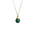 Close-up of teardrop natural stone pendant with gold plating and fine link chain - Ruby Zoisite