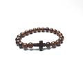 Detailed view of red and black jasper beaded bracelet with a metal cross charm - Mahogany Obsidian