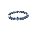 Close-up of blue and white natural stone beaded bracelet with a matching cross charm - Blue Spot Jasper