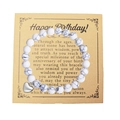 Detalle de pulsera de cuentas de mármol blanco con colgante de corazón y tarjeta de regalo - Con Tarjeta / Howlita