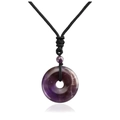 Macro detail of purple amethyst Ping'an buckle pendant with black woven cord necklace - Amethyst