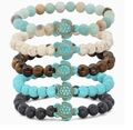 Detail view of five beaded bracelets with turquoise turtles and volcanic stones - Ocean Series (SL2256526)