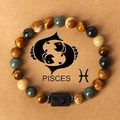 Detail of Pisces natural tiger eye stone beaded bracelet on craft paper card display - Pisces