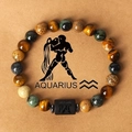 Macro detail of Aquarius zodiac bracelet with natural tiger eye and stone beads - Aquarius