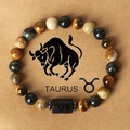 Natural Tiger Eye stone beaded bracelet with black Taurus zodiac engraved barrel charm - Taurus