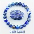 Natural 8mm lapis lazuli beaded stretch bracelet with deep blue stone and golden pyrite - Lapis Lazuli