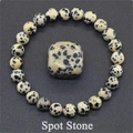 Dalmatian spot stone beaded bracelet with center square stone on dark background - Dalmatian Jasper