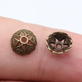 Calottes fleurs en alliage de zinc bronze 8mm pour bijoux DIY avec motifs de cœur et ajours - Bronze Antique