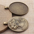 Oval 30x40mm vintage bronze pendant base with detailed cameo flower relief jewelry setting - 30x40mm / Antique Bronze
