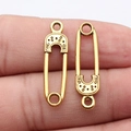 Vintage style gold safety pin charm pendant for DIY jewelry making on human finger - Antique Gold