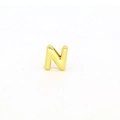 Close-up of polished gold-plated letter N charm for DIY jewelry bracelets and necklaces - Letter N Component