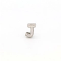 Macro shot of silver letter J pendant with micro-pave cubic zirconia stones - DIY Letter Charm-J / Silver Rhinestone Letter J