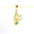 Detailed view of a gold-plated floral pendant with white zircon and a green gemstone - Gold