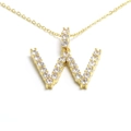 Close-up of gold-plated W letter pendant necklace with sparkling cubic zirconia pavé - Letter W / Gold