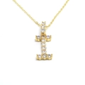 Macro shot of letter I pendant necklace with sparkling pavé cubic zirconia - Letter I / Gold