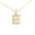 Macro view of gold letter E pendant necklace with sparkling cubic zirconia pavé setting - Letter E / Gold