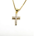 Detailed view of gold cross pendant with 11 round cubic zirconia on box chain - Classic 11-Stone Simple Cross