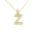 Macro shot of gold letter Z pendant encrusted with clear crystals on a delicate chain - Letter Z / Gold