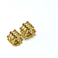 Detail of gold hollow multi-layer ear clips inlaid with colorful zircon gemstones - Hollow Cylinder Style / Gold