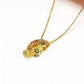 Macro shot of gold flip-flop pendant necklace with colorful cubic zirconia crystals - Gold Slipper Necklace