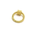 Detailed macro view of golden twisted spiral ring featuring a micro-beaded barrel charm - Gold Twisted Round Clasp